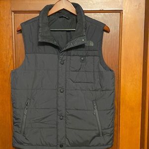 The North Face vest. Black with black logo. Size Small. Excellent condition.